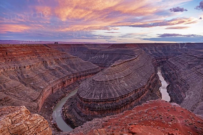 View over deep incised meander of the San Juan River in Goosenecks State Park at sunset