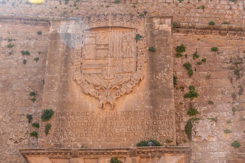Shield at the entrance of the wall of the coastal city of Ibiza
