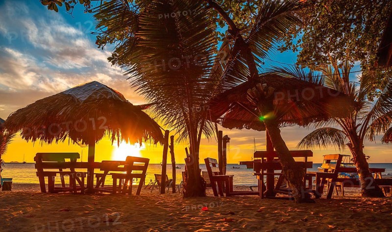 A terrace on the beach at Sunset from West End Beach