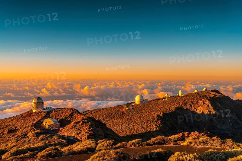 Observatories of Roque de los Muchachos in the Caldera de Taburiente in a beautiful orange sunset