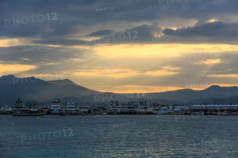 View from the Croisette in the evening of yachts during the Cannes Yachting Festival