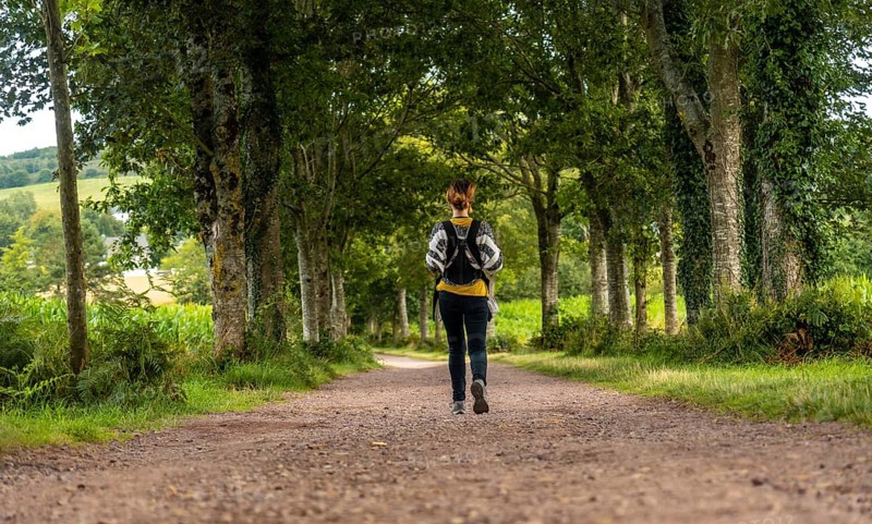 A young mother with her baby in the Broceliande forest