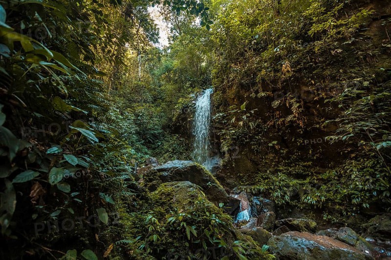 Waterfall and its natural environment of the Cerro Azul Meambar National Park