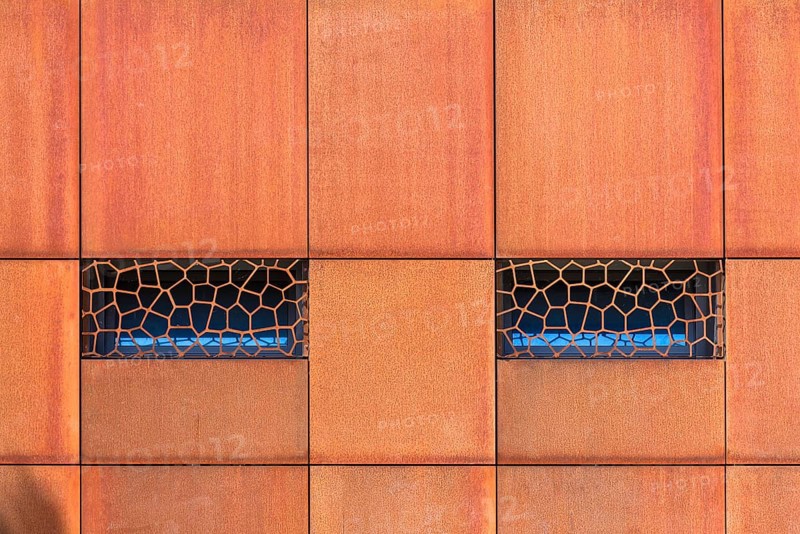 Window in a metal facade of a restaurant