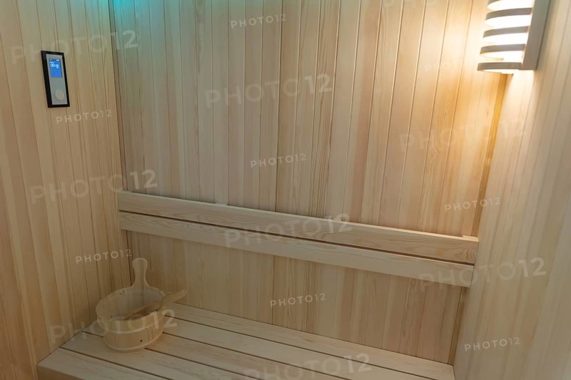 Empty not heated clean wooden finn sauna. Mid shot