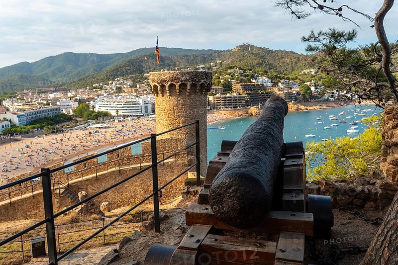 Beautiful war cannon in the castle of Tossa de Mar in summer