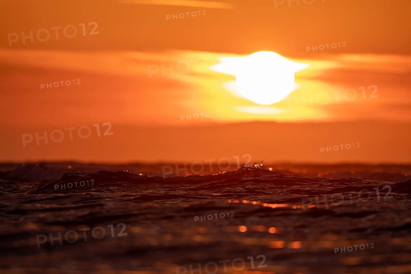 Sunset on the beach of De Panne