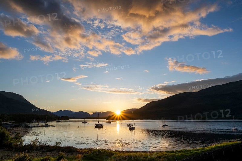 Sunset over the freshwater loch Loch Leven