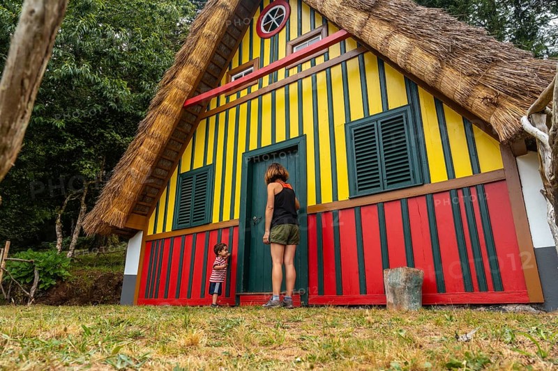 Playing in a traditional Madeiran house like those of Santana in the forest of Caldeirao Verde