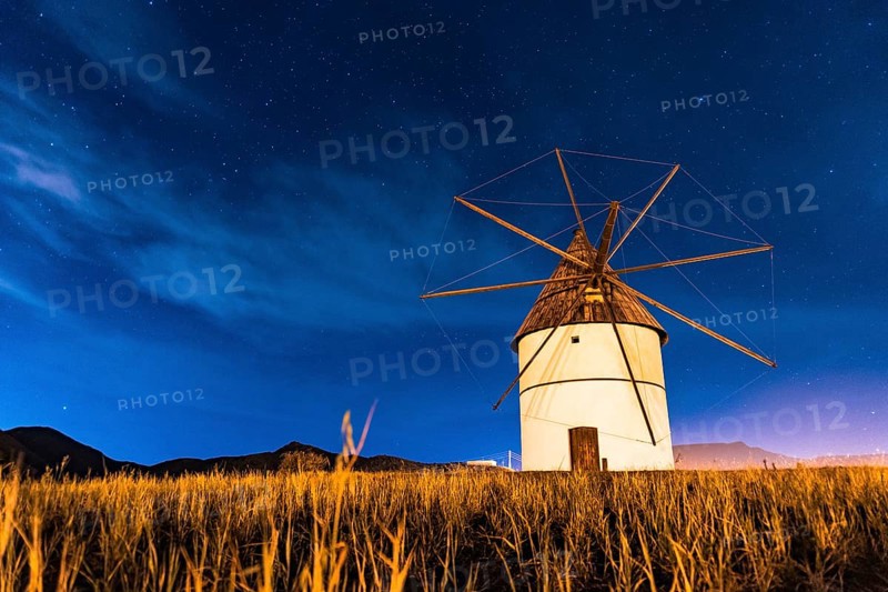 Molino del Pozo de los Frailes at night in the town of San Jose in Cabo de Gata