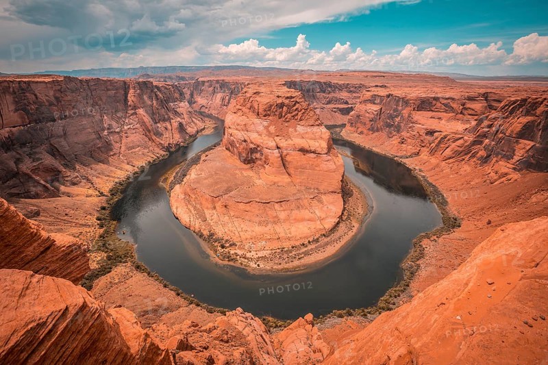 The stunning Horseshoe Bend and the Colorado River in the background with retouching Orange Teal