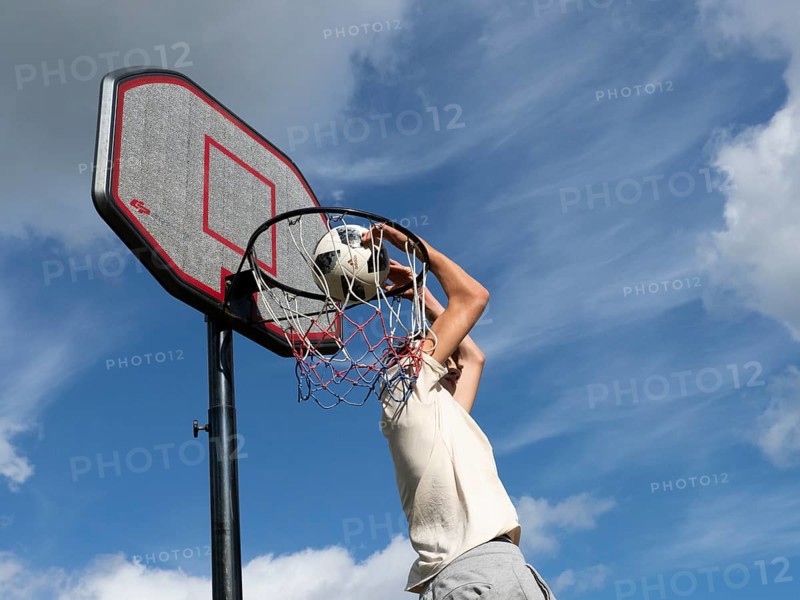 Basketball Jump with the ball to the basket and net