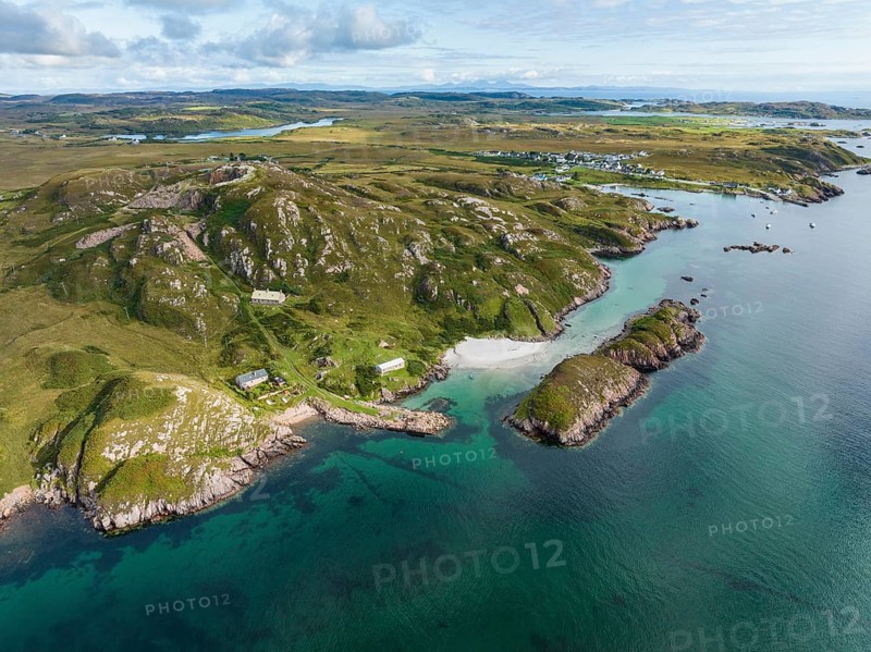 Aerial view of the Ross of Mull peninsula and the fishing village of Fionnphort in the picture on the right