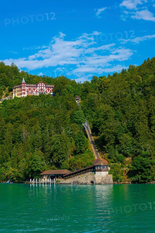 The Historical Grandhotel Giessbach and Cable Train on the Mountain Side on Lake Brienz in Giessbach