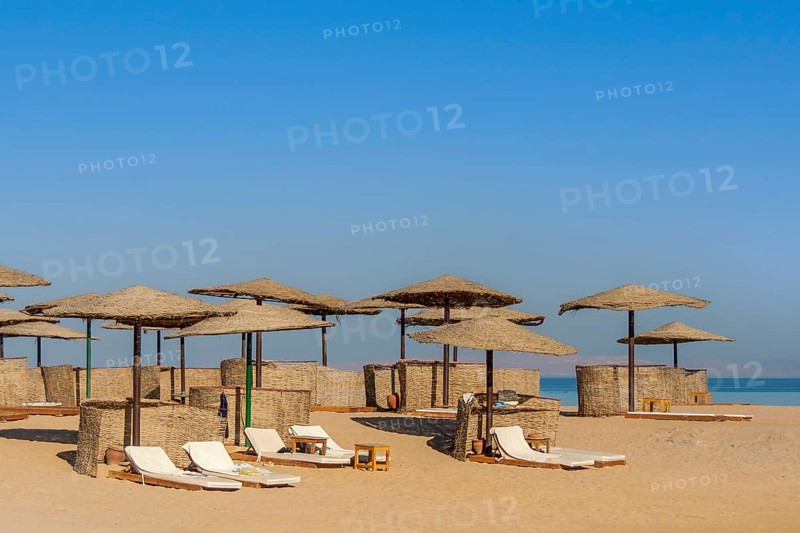 Parasol and sun loungers