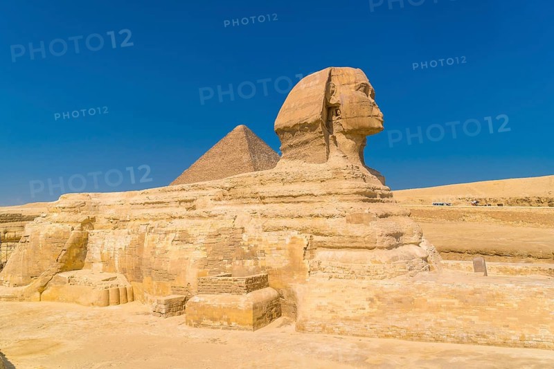 The Great Sphinx of Giza and in the background the Pyramids of Giza
