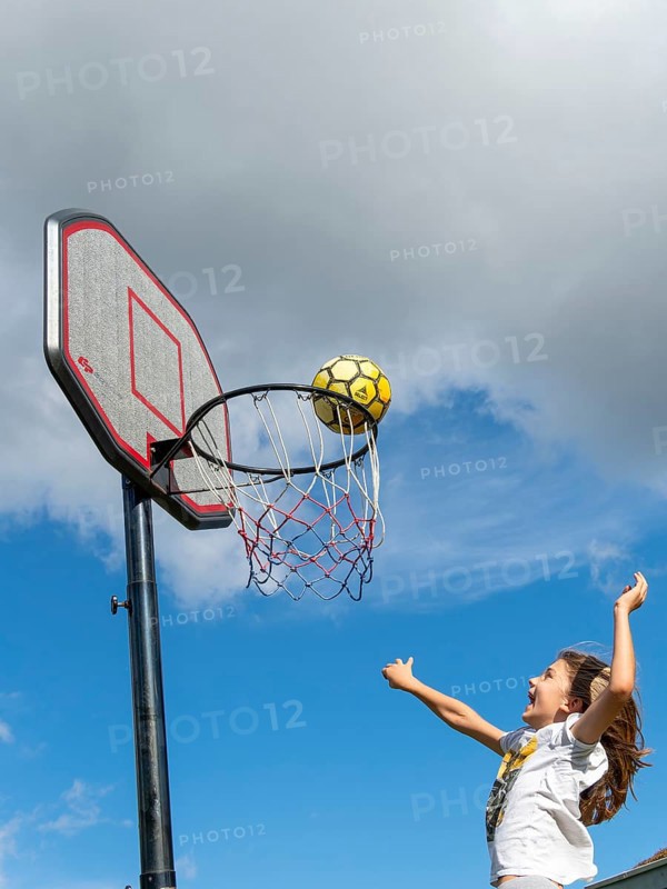Basketball Jump with the ball to the basket and net