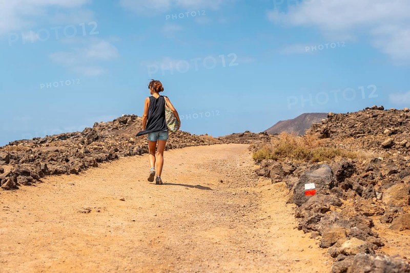 A young woman visiting the Isla de Lobos