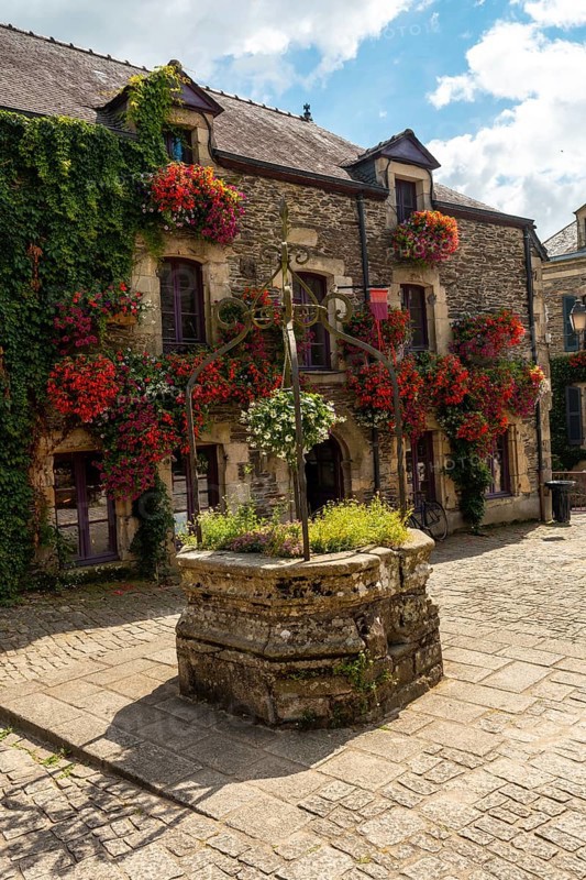 Water well in the square of the medieval village of Rochefort-en-Terre