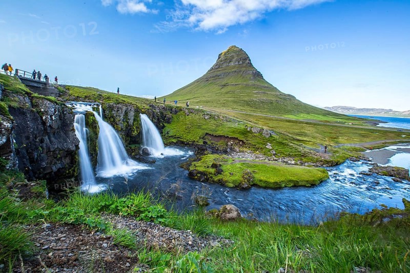The famous Icelandic mountain Kirkjufell and the small waterfalls