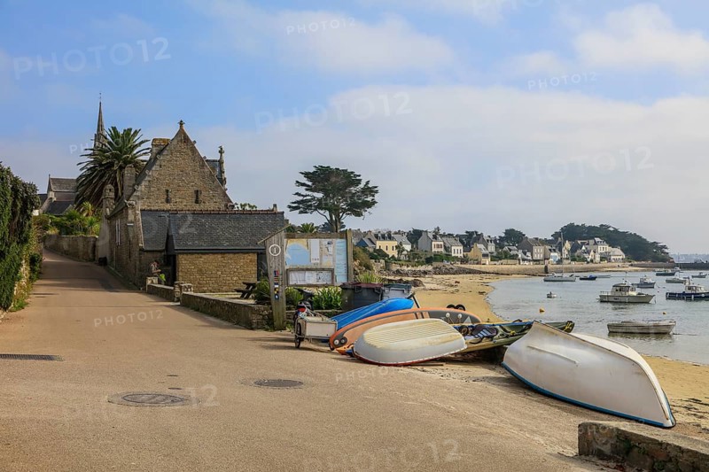 Bay with sandy beach in the centre of the village