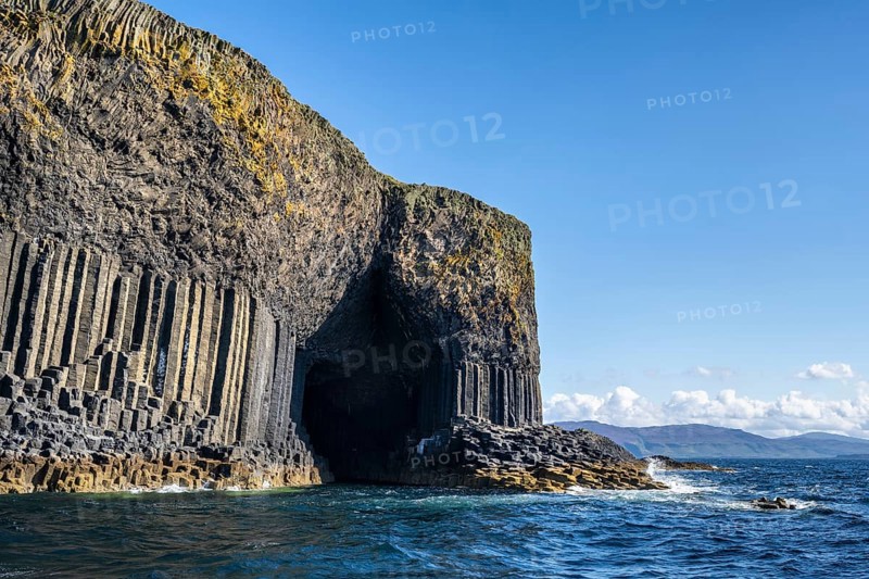 Detail of the uninhabited rocky island of Staffa with the polygonal basalt columns and Fingal's Cave Hebrides