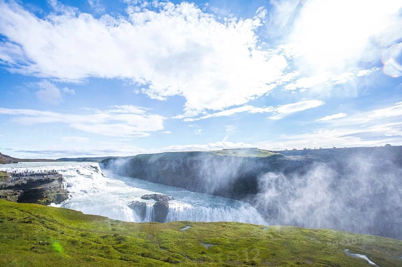 The Gullfoss waterfall in the golden circle of the south of Iceland with lots of water one summer morning