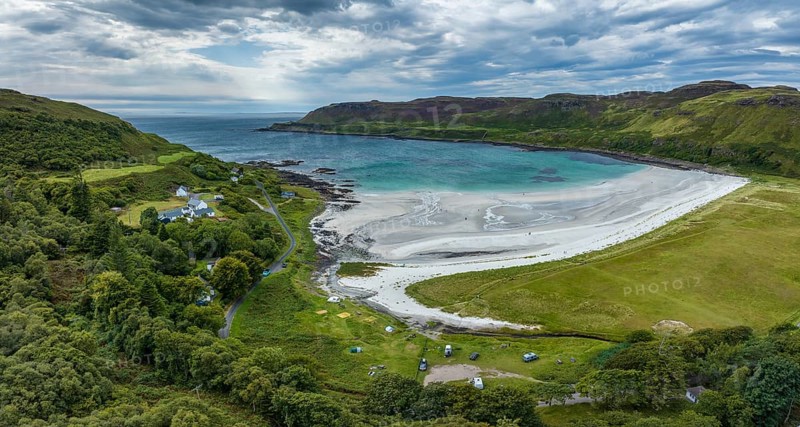Aerial panorama of Calgary Beach sandy beach with campsite in Calgary Bay