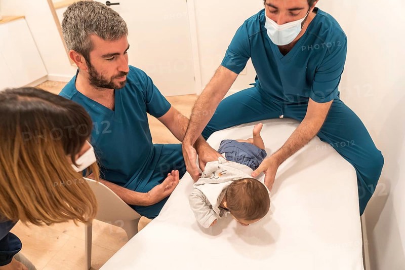 Mother visiting the pediatrician with a newborn baby
