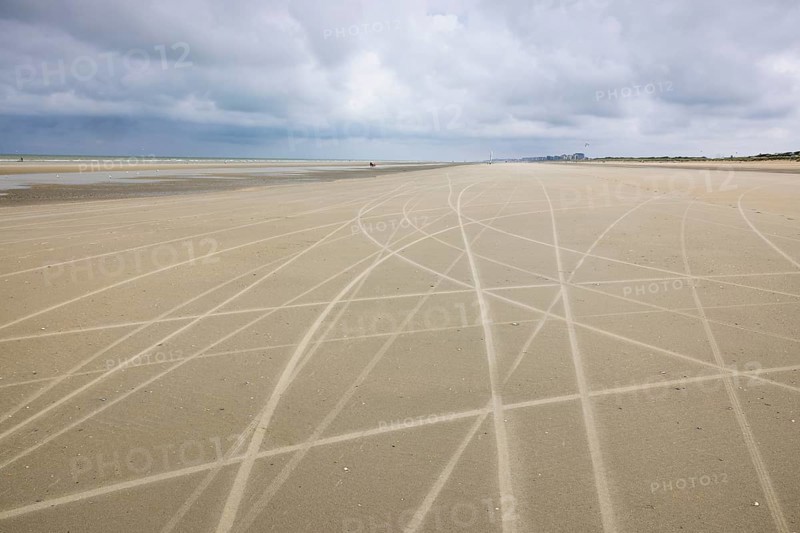 Traces of beach sailors in the sandy beach