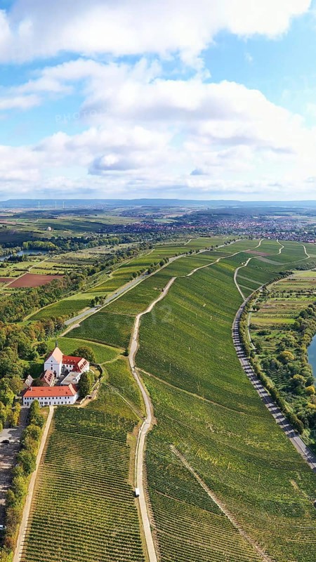 The Mainschleife near Volkach winds through the valley and is surrounded by fields and vineyards. Volkach