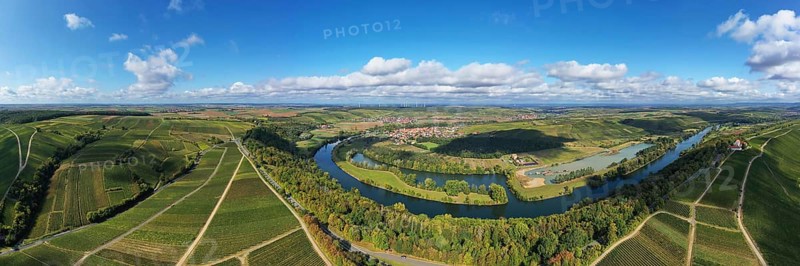 The Mainschleife near Volkach winds through the valley and is surrounded by fields and vineyards. Volkach