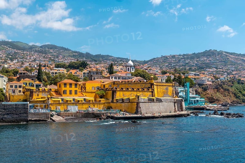 View of the seaside fort of Forte de Sao Tiago on Funchal beach in summer. Madeira