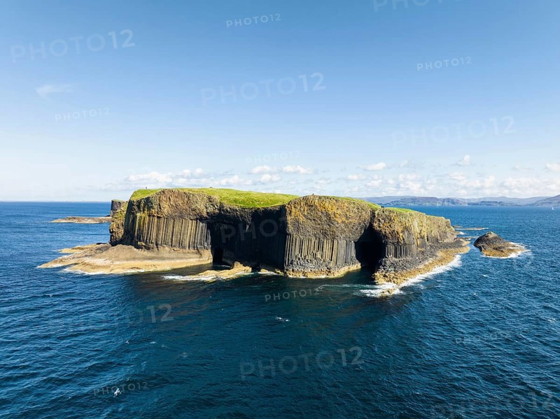 Aerial view of the uninhabited rocky island of Staffa with the prominent basalt columns and Fingal's Cave