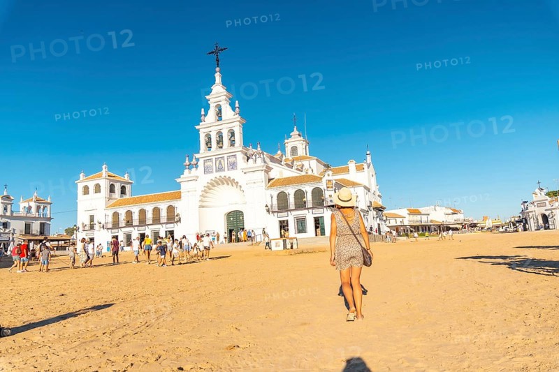 A young tourist visiting the El Rocio sanctuary at the Rocio festival