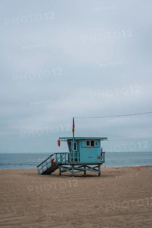 The beautiful blue lifeguard house on the coast of Malibu