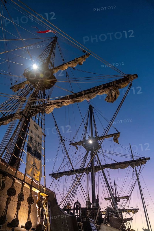 Old boat in the promenade of Muelle Uno in the Malagaport of the city of Malaga