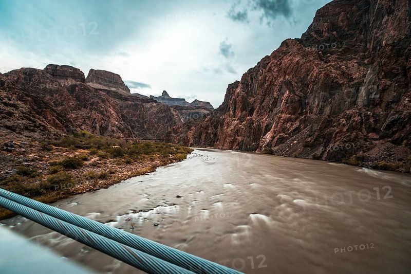 Long exposure on a cloudy afternoon of the Colorado River on the Bright Angel Trailhead route in the Grand Canyon. Arizona