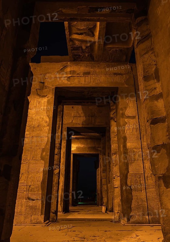 Beautiful columns of the Kom Ombo temple at night illuminated
