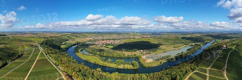 The Mainschleife near Volkach winds through the valley and is surrounded by fields and vineyards. Volkach