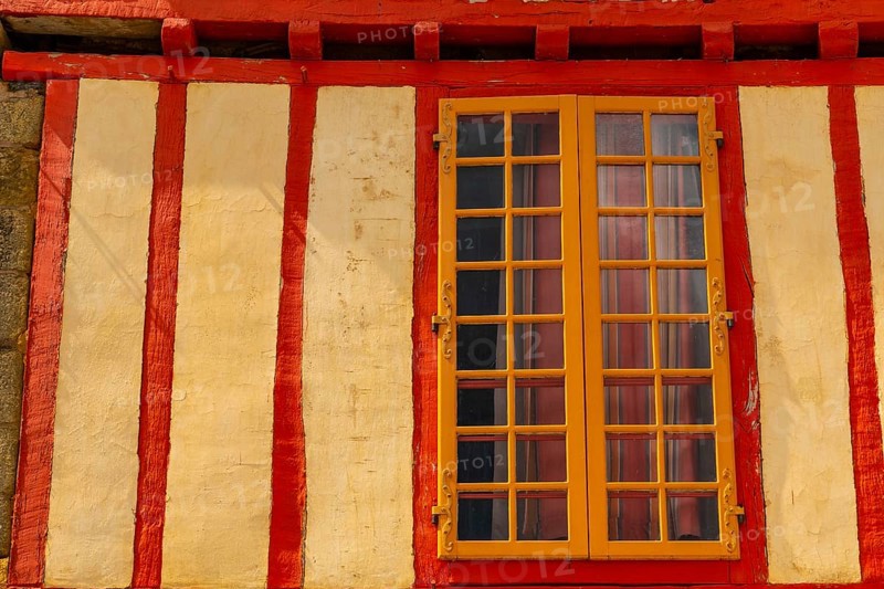 Old colored house in the medieval village of Rochefort-en-Terre
