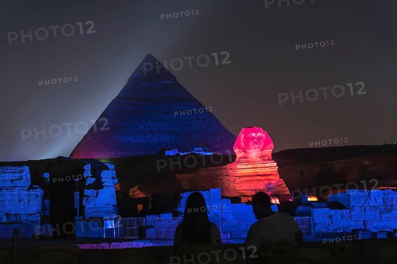 Sound and light show at the beautiful pyramids and sphinx of Giza. Night in the city of Cairo. Africa