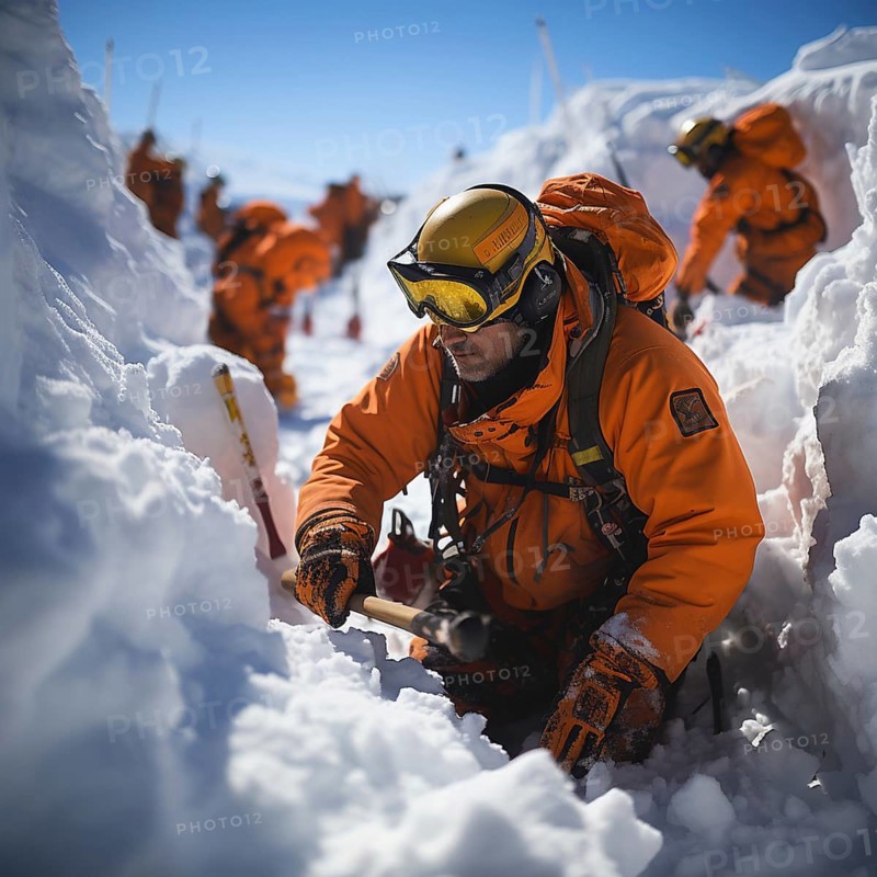Helpers use evacuation aids to search for people buried in an avalanche