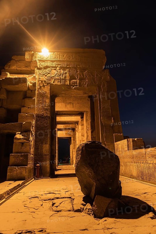 Gorgeous columns and the sacred stone of the Kom Ombo Temple at night illuminated