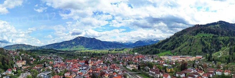 Aerial view of Immenstadt im Allgaeu with a view of the Alps. Immenstadt im Allgaeu