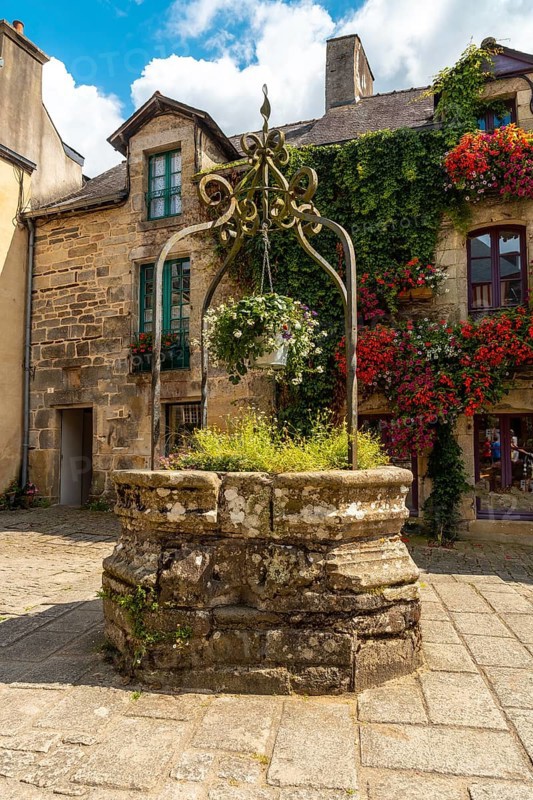 Water well in the square of the medieval village of Rochefort-en-Terre