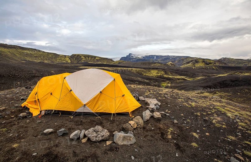 A yellow tent at the Landmannalaugar refuge for trekking. Iceland