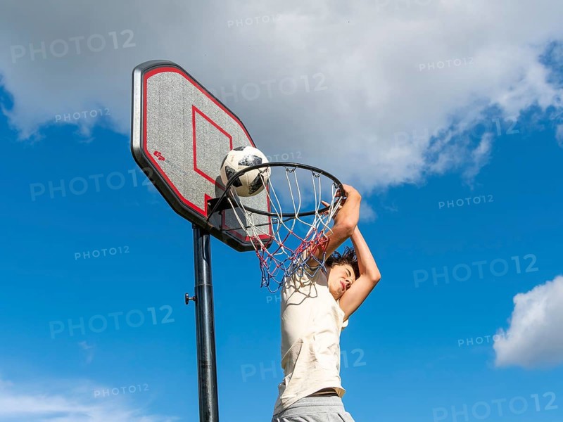 Basketball Jump with the ball to the basket and net