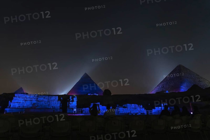 Sound and light show at the beautiful pyramids and sphinx of Giza. Night in the city of Cairo. Africa