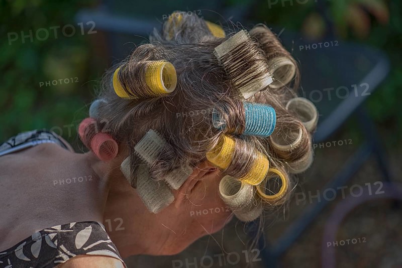 Woman's head with curlers